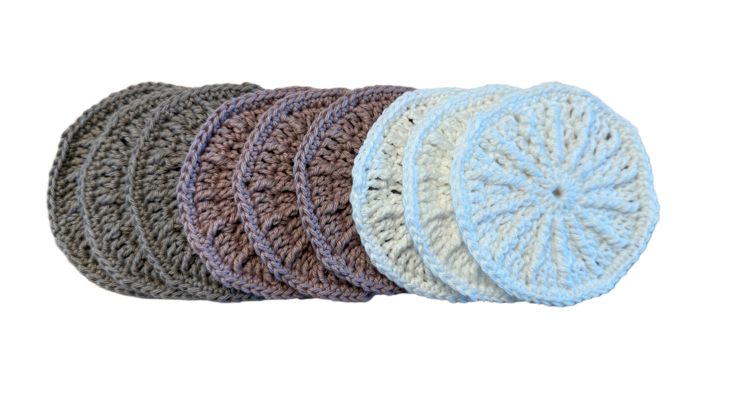 Set of round crochet resuseable makeup remover pads or radiant scrubbies in varigated colors.