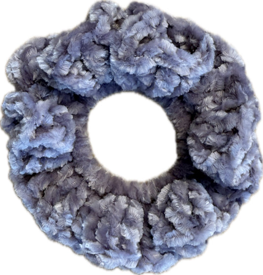 Lavender scrunchie on a white background