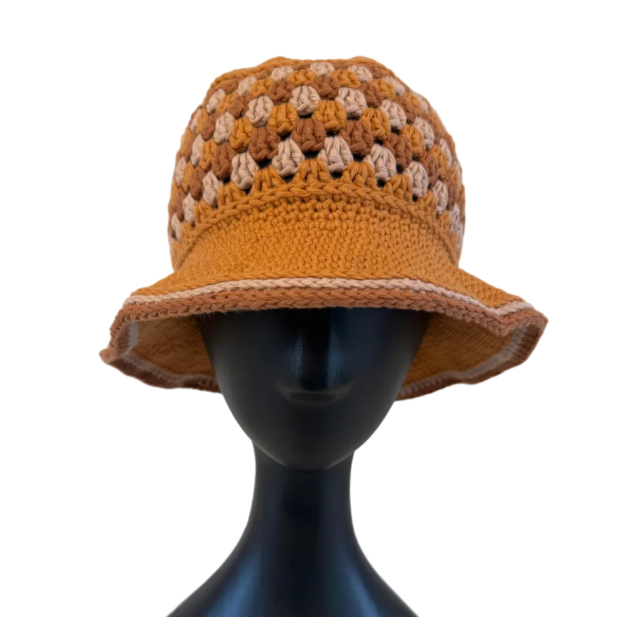 A gold/brown crocheted bucket hat displayed on a black mannequin head on a white background