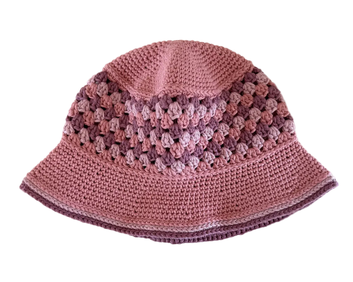 A mauve-rose crocheted bucket hat on a white background