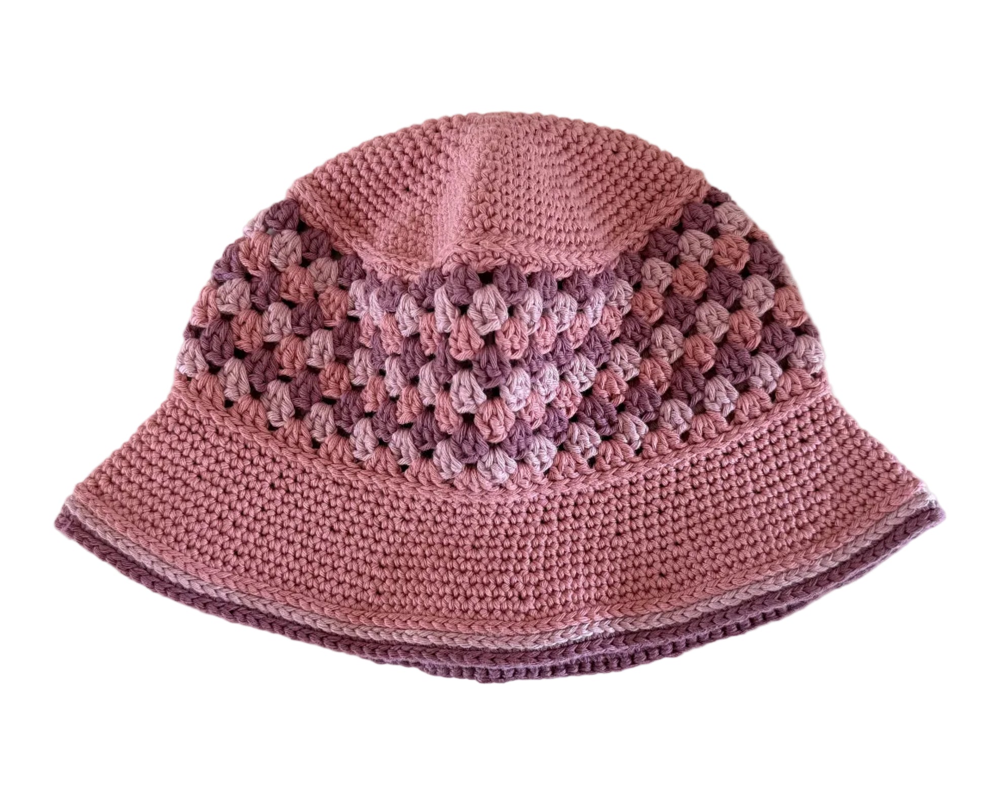 A mauve-rose crocheted bucket hat on a white background