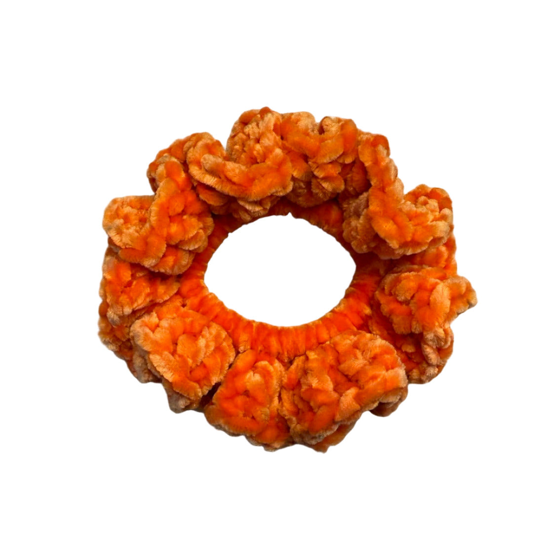 Orange scrunchie on a white background